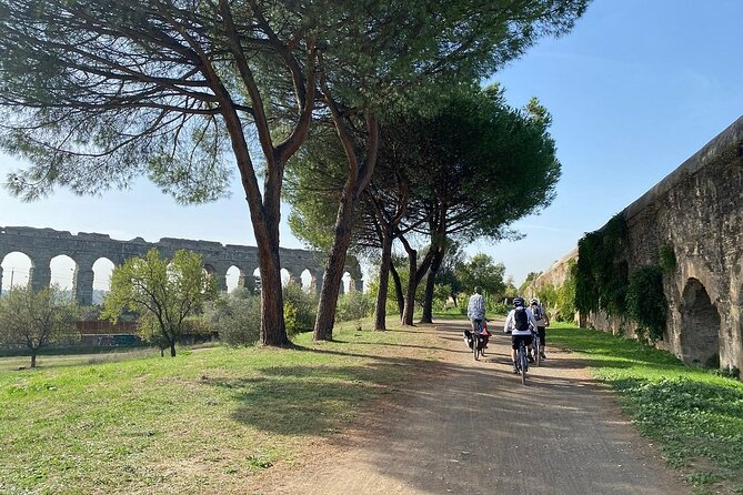 Appian Way, Catacombs and Aqueducts Park Tour with Top E-Bike - Appian Way proper: from everyday street to preserved ancient road
