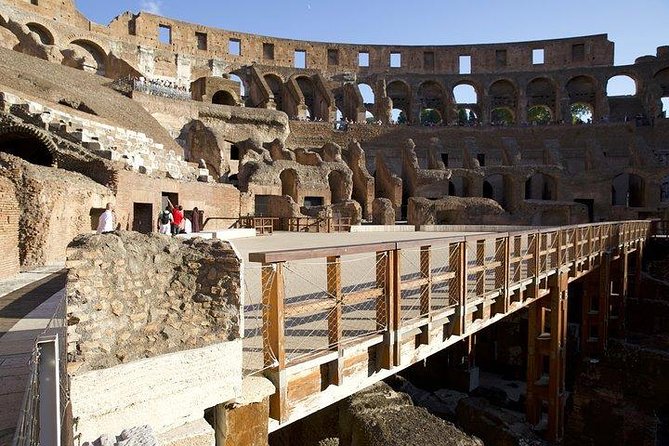 Colosseum Express Guided Tour and Ancient Rome Admission Included - Entering the Colosseum: gladiators, engineering, and views from the tiers