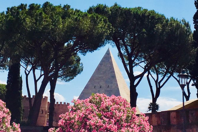 Gems of Rome: Small Group E-Bike Tour with Street Food stops - Entering the Colosseum Area and Getting Oriented Fast