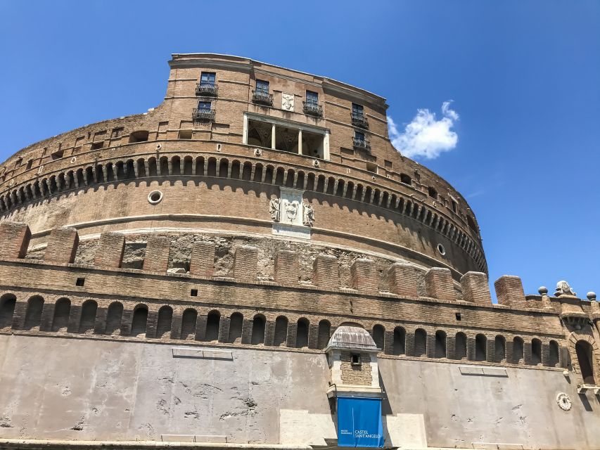 Rome: Castel Sant'Angelo Skip-the-Line Ticket - Redeeming your voucher at the entrance with orange umbrella help