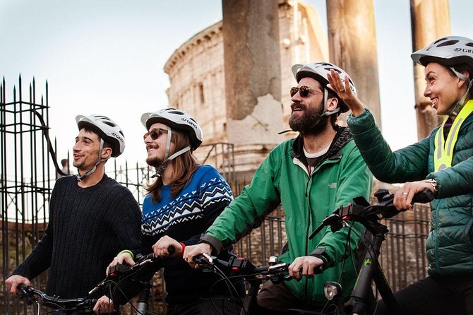 Rome City Small Group Bike Tour with quality Cannondale EBike - Piazza Venezia: Trajan’s Column and three layers of Rome
