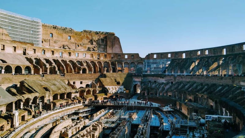 Rome: Colosseum Arena Guided Tour, Forum & Palatine Option - Guide-led learning: why headphones matter in a busy monument