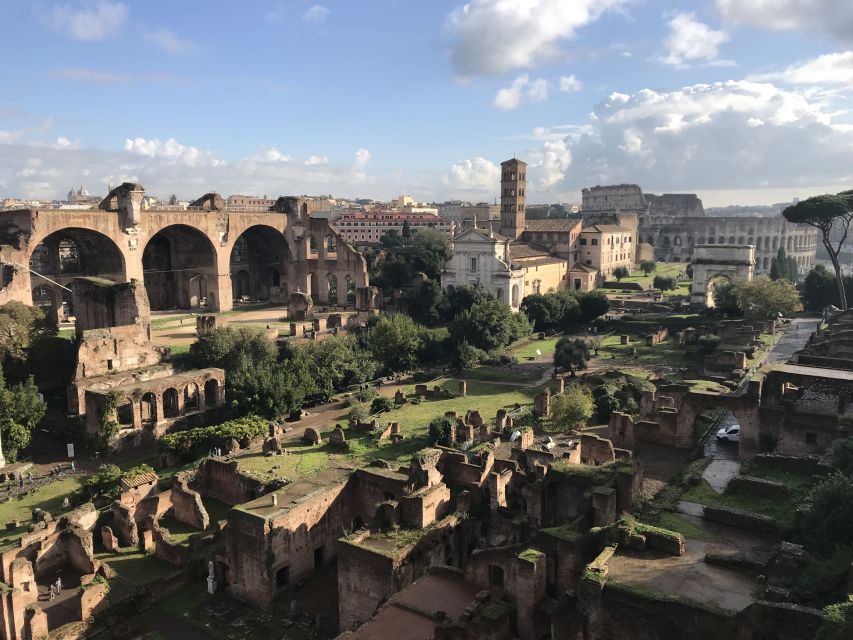 Rome: Colosseum, Forum, and Palatine Hill Guided Tour - Inside the Colosseum: first and second tiers and the stories that make it real