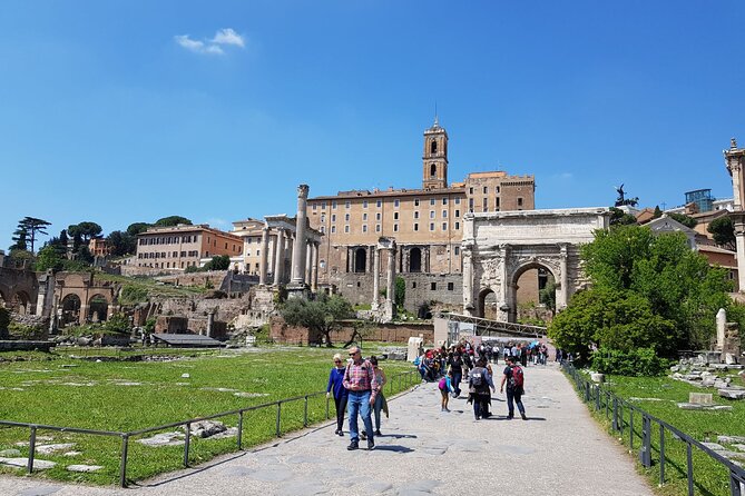 Rome: Colosseum, Palatine Hill and Roman Forum Guided Tour - Roman Forum Center: Curia, Septimius Severus, Tabularium, Saturn