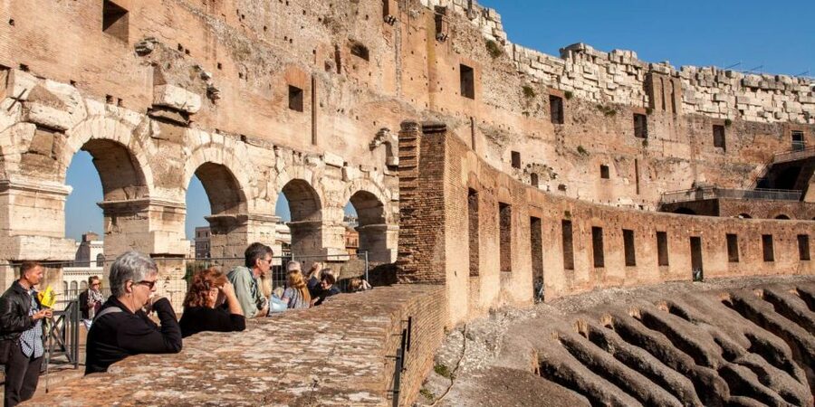 Rome: Colosseum, Palatine & Roman Forum Tour w/Entry Ticket - Starting at Largo Gaetana Agnesi and the Tour Spot sign