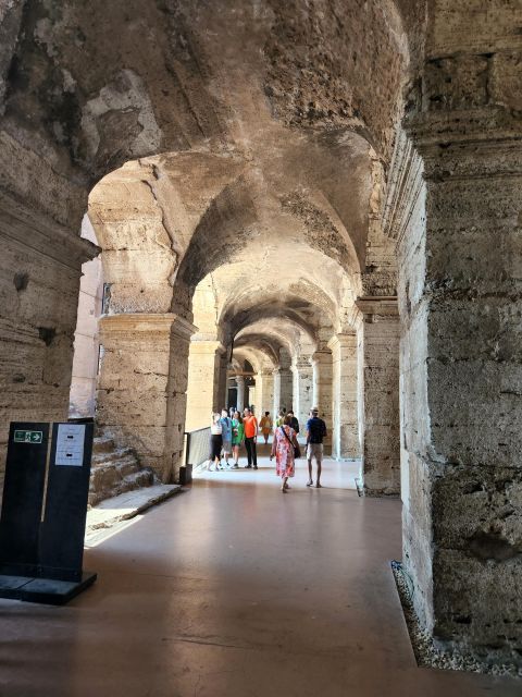 Rome: Colosseum, Roman Forum, and Palatine Hill Ancient Tour - Inside the Colosseum: first and second rings, plus the real feel of the arena