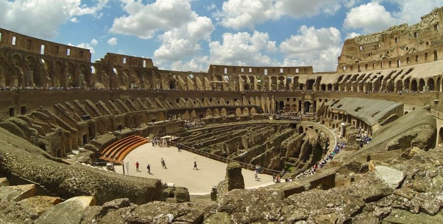 Rome: Colosseum, Roman Forum, and Palatine Hill Tour - Roman Forum stop: temple remains with story-based context