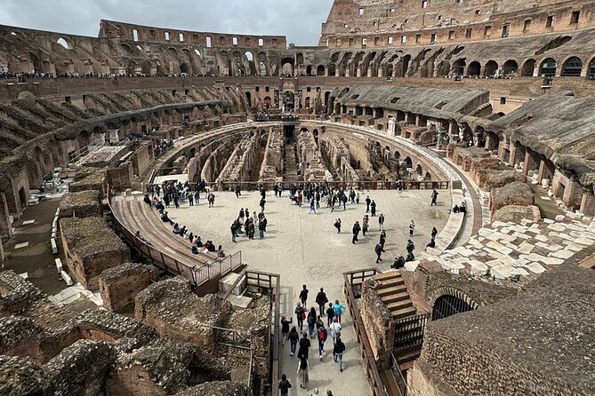 Rome: Colosseum, Roman Forum & Palatine Hill Visit + Audio Guide - Entering the Colosseum: timed entry, security first