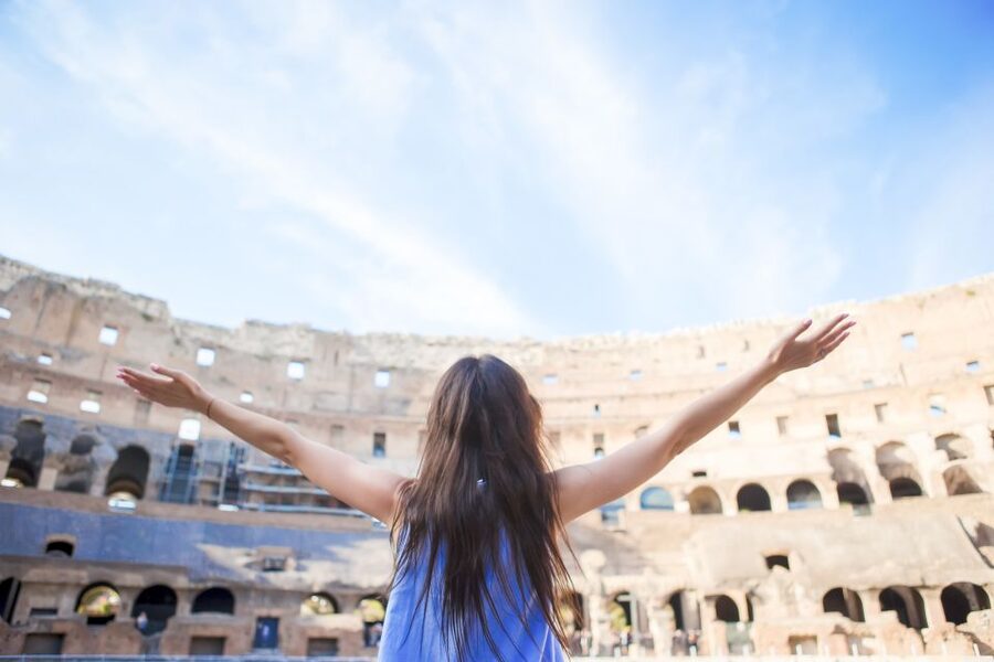 Rome: Colosseum Underground, Arena & Forum Tour - Entering the Colosseum with the guide leading