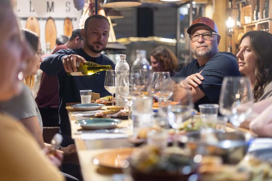 Rome: E-Bike Night Tour with Food and Wine Tasting - Jewish Ghetto and Campo de’ Fiori: smaller streets, real atmosphere