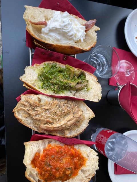 Rome: Food Tour with Unlimited Food and Barolo Wine - Stop 2 at the gourmet shop: Parmigiano, buffalo mozzarella, and 30-year balsamic