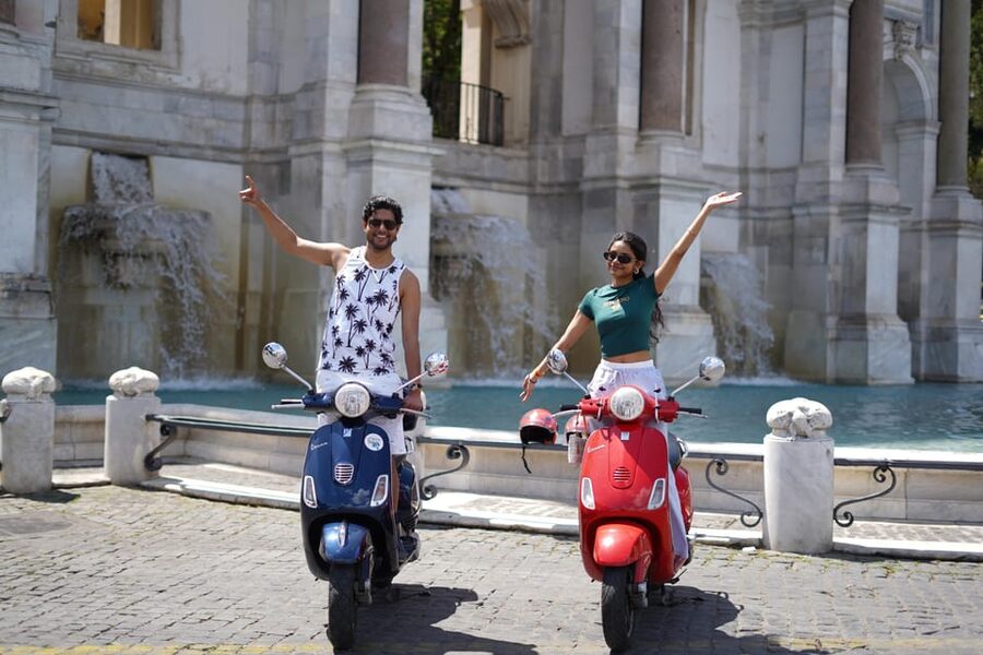 Rome: Guided Vespa Tour with Photo Stops - Meeting at Caffè Roma, helmet on, sightseeing starts fast