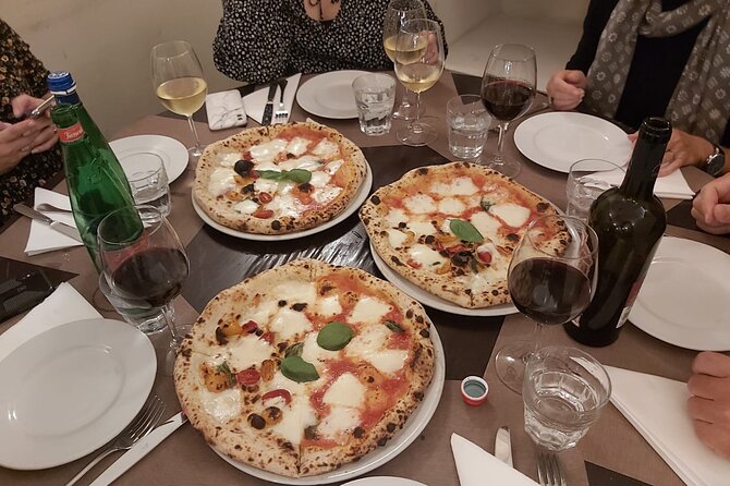 Rome: Pizza & Tiramisu Class with Free Flowing Fine Wine - Free-flowing fine wine: fun included, with a smart caution